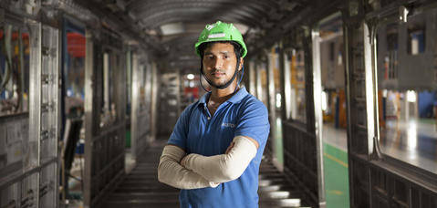 Worker posing in  Sri City site, India